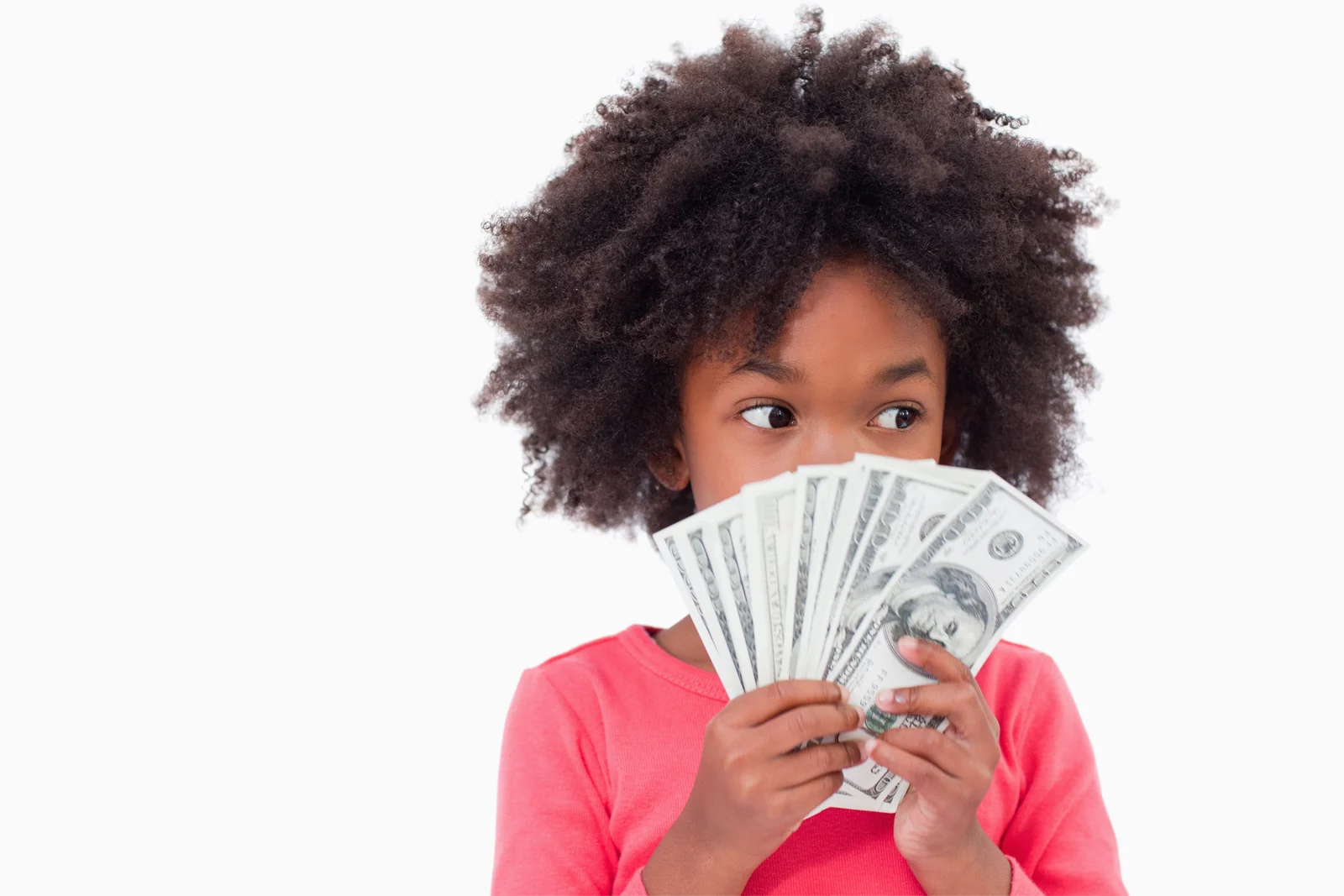 Black girl holding banknotes while learning money management